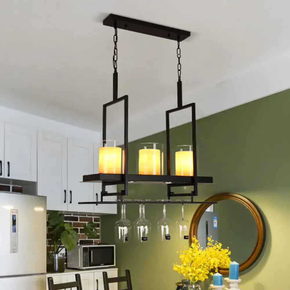 DecorBites black metal island light fixture with three amber candle lights and clear glass cylindrical wine holders