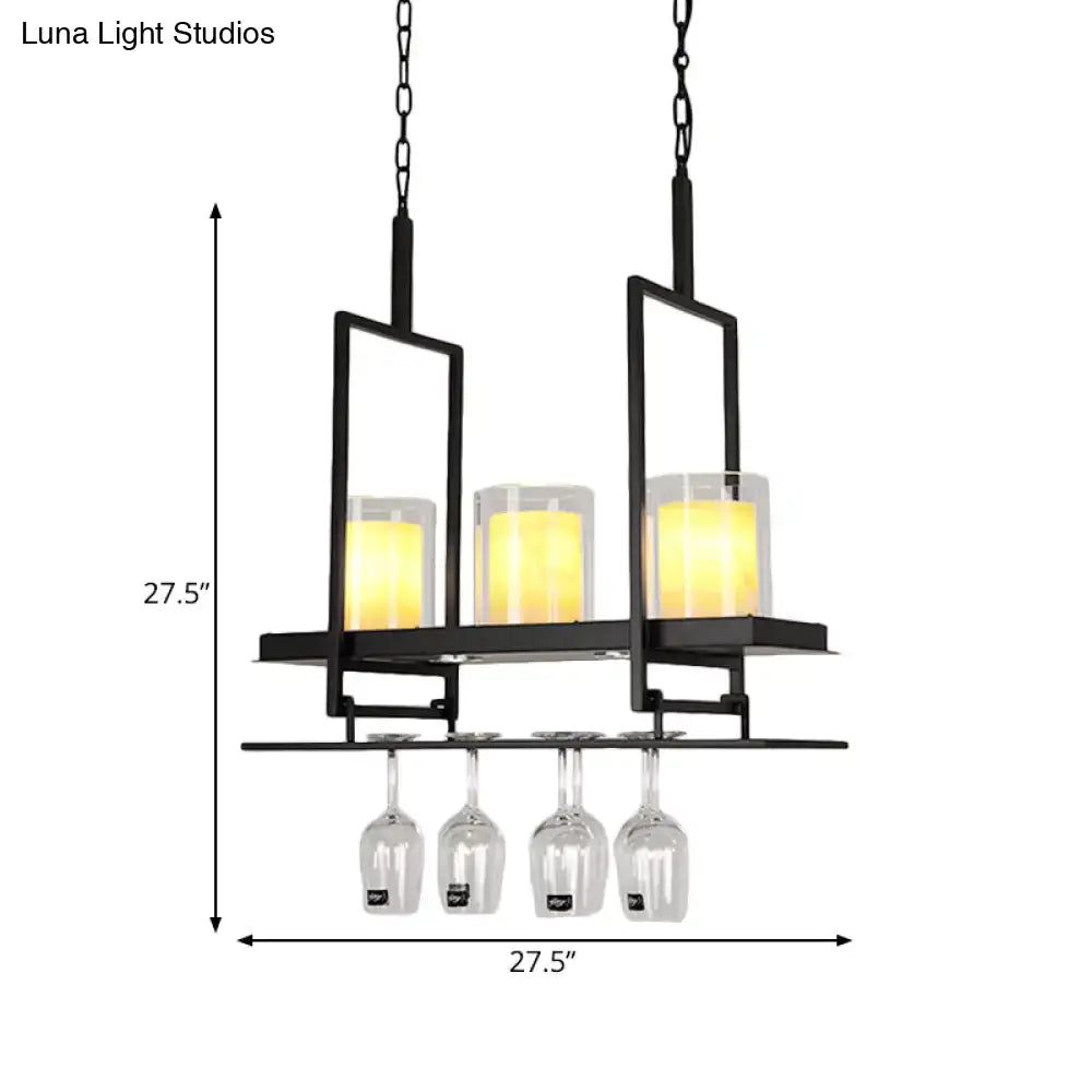 DecorBites black metal island light fixture with clear glass cylindrical pendants and a glass shelf for wine glasses
