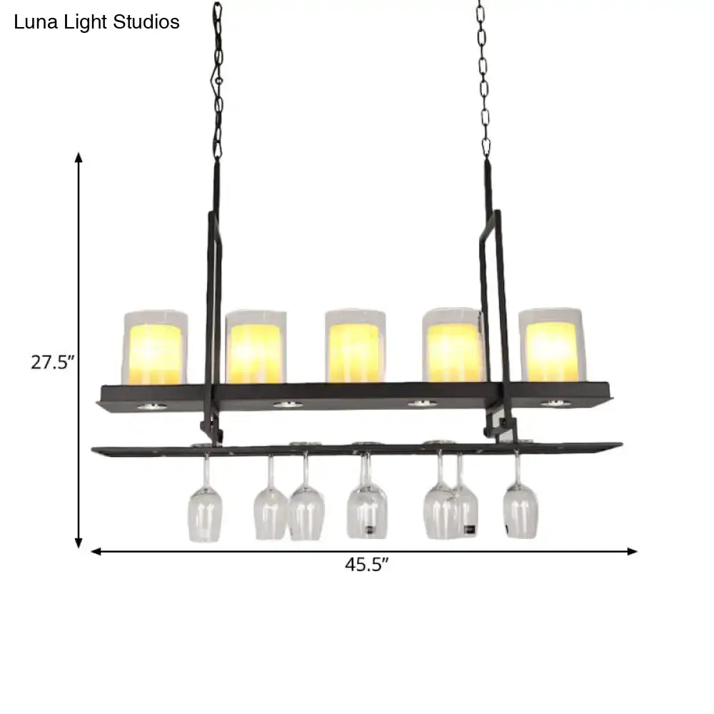 DecorBites black metal island light fixture with clear glass cylindrical pendants and five warm candle-style lights