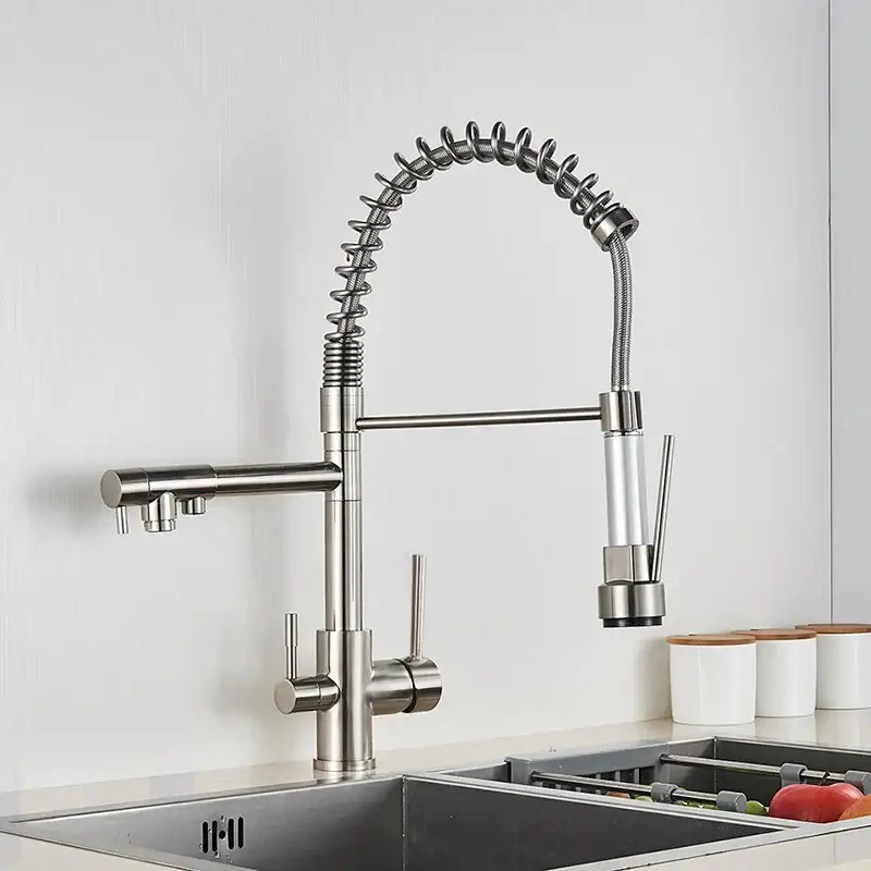 Modern black matte stainless steel water filter faucet with flexible coiled hose and pull-down spray head for kitchen use