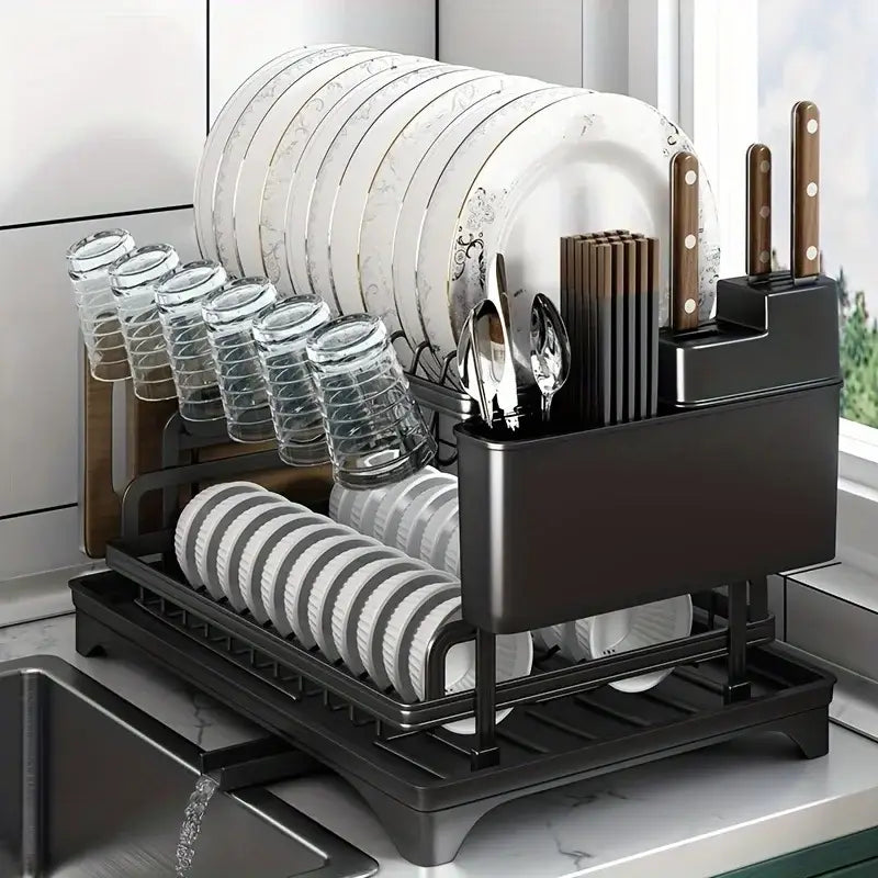 Black metal 2 tier dish drying rack with multiple tiers holding plates glasses and cutlery for kitchen storage use