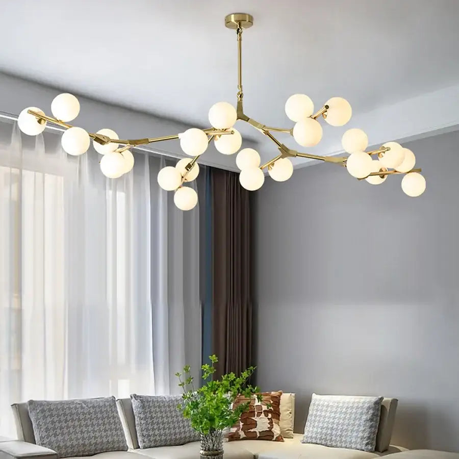Gold-toned branch-style black metal glass ball led chandelier with frosted globe bulbs for living room decorbites glass ball
