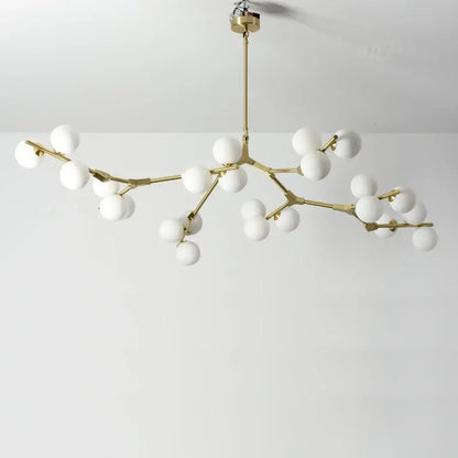 Gold-toned branch-style black metal glass ball led chandelier with multiple white spherical globes for living room decorbites glass ball