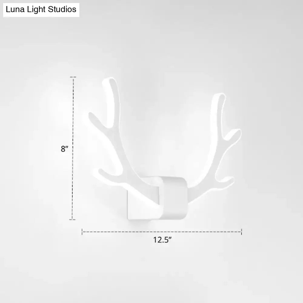 White deer antler-shaped wall mounted lighting fixture featuring black metallic antler sconce for bedroom decor