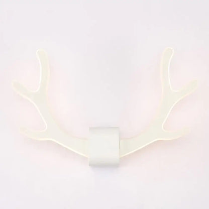 White led wall sconce shaped like deer antlers featuring metallic antler sconce design for bedroom wall mounted lighting