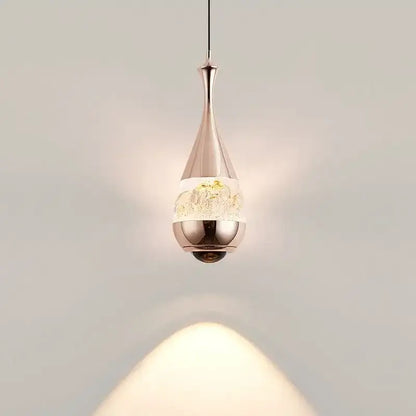 A sleek black mountain glass pendant chandelier with polished chrome and frosted glass for dining room decor