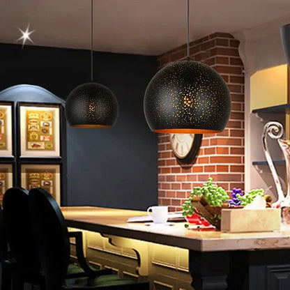 Black nordic industrial pendant light with speckled starry pattern and warm interiors for dining room decorbites pendant light