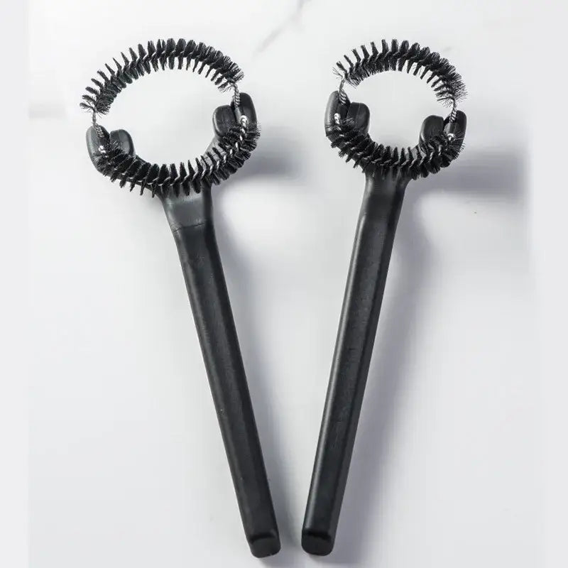 Black plastic coffee machine grinder brush with dense bristles and circular handle for decorbites coffee machine cleaning