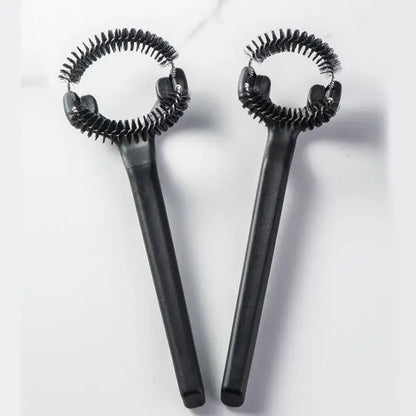Black plastic coffee machine grinder brush with dense bristles and circular handle for decorbites coffee machine cleaning