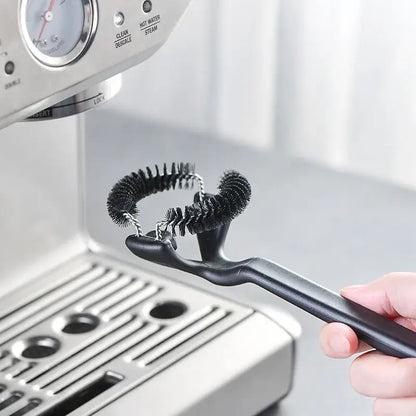 Black plastic coffee machine grinder brush with dual coiled bristle heads for decorbites coffee machine cleaning