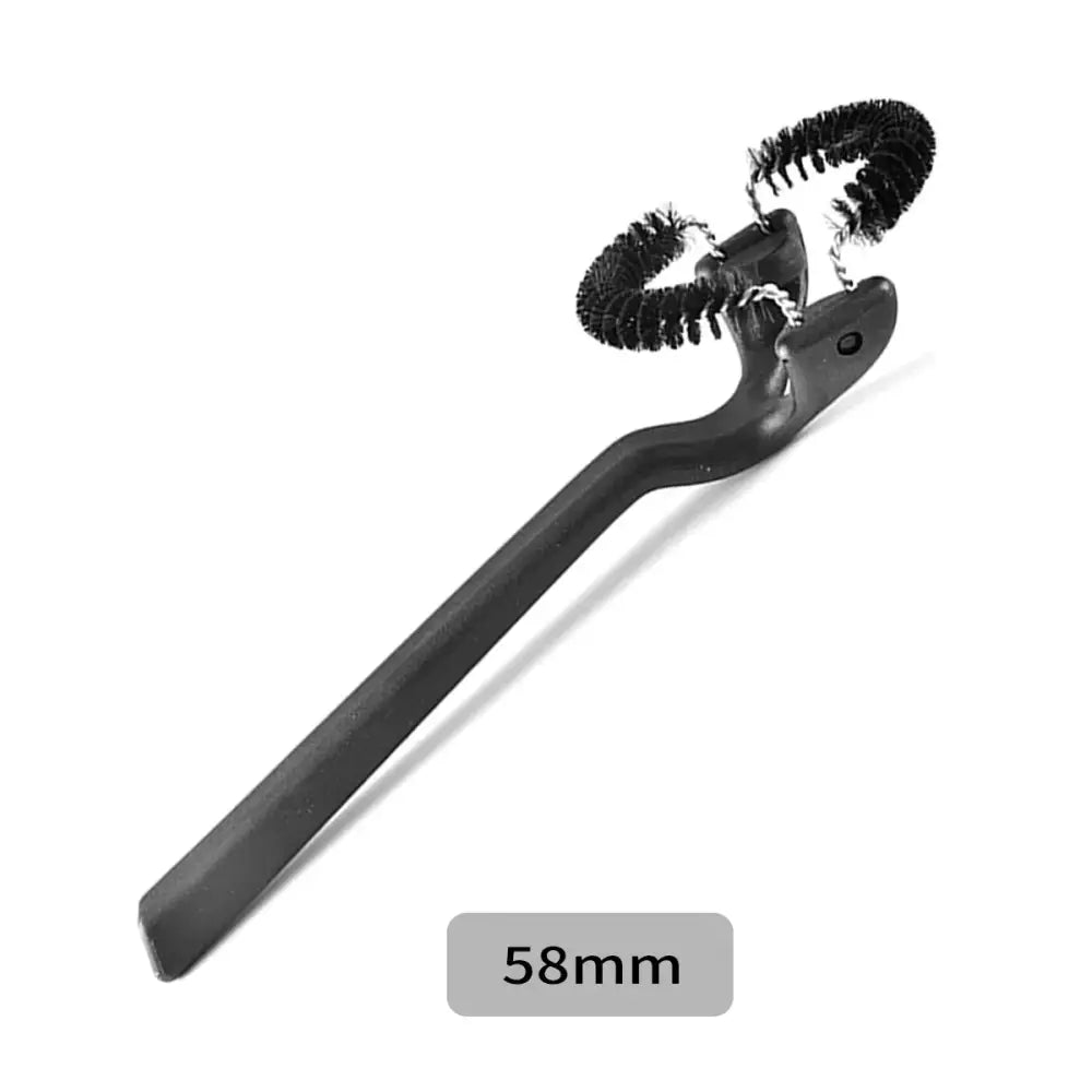 Black plastic coffee machine grinder brush with two coiled metal bristle heads by decorbites for cleaning coffee machines