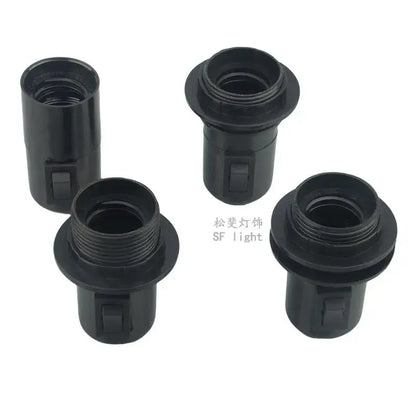 Black plastic e27 socket lamp base with integrated switch and threaded interior for bedroom use