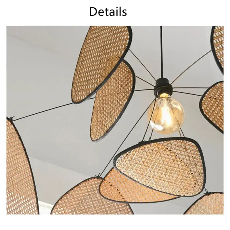 A warm-toned black rattan ceiling chandelier with woven design and black-framed leaf-shaped shades for dining room decorbites black rattan