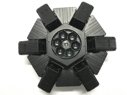 Black hexagonal beam moving head stage light with eight ribbed arms and central bee eye led strobe lens array