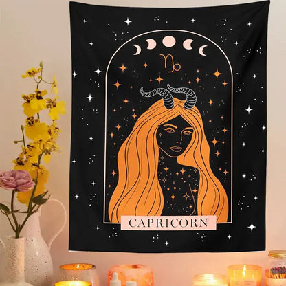 Black capricorn zodiac tapestry featuring an orange horned figure with stars and moon phases decorbites celestial constellation wall art