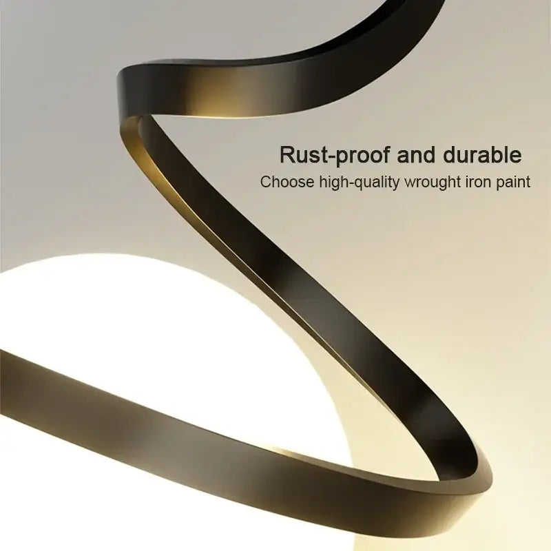 Black spiral dual globe pendant light with matte black finish and gold edges showcasing kitchen cord pendant installation method