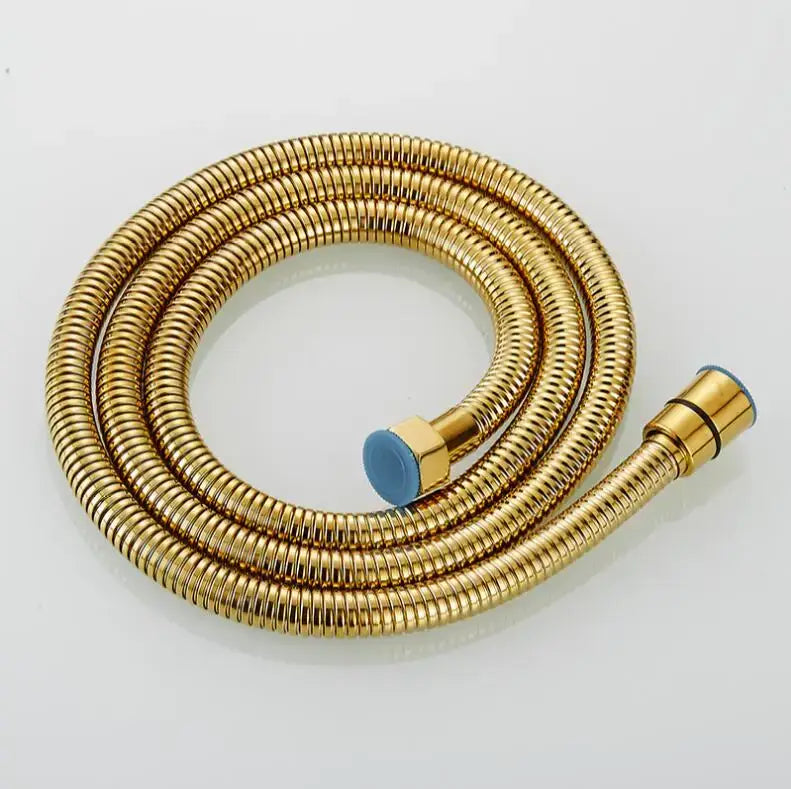 Gold-colored stainless steel flexible shower hose with brass fittings and blue rubber cap for bathroom use
