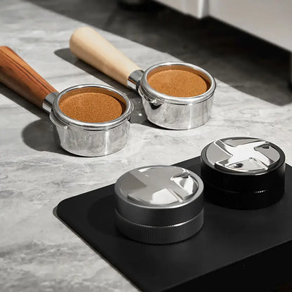 Silver and black decorbites espresso tamper with textured grip and modern design for precise kitchen use