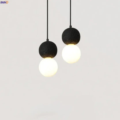Black travertine led pendant light with black lava stone and frosted glass globe for dining room decorbites black travertine