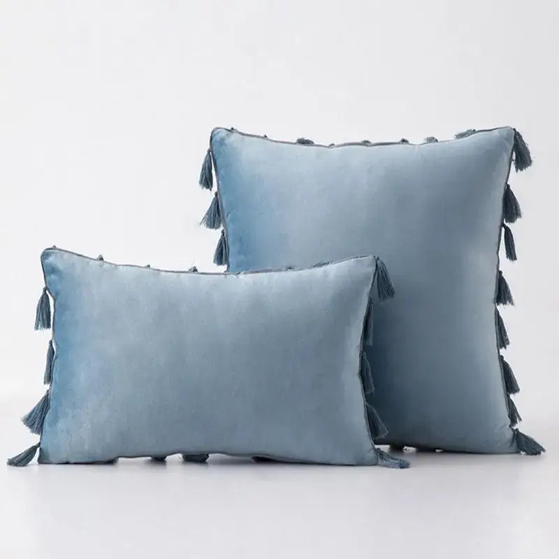 Soft blue velvet pillow cover with tassel fringe edges for living room decor by decorbites black velvet collection
