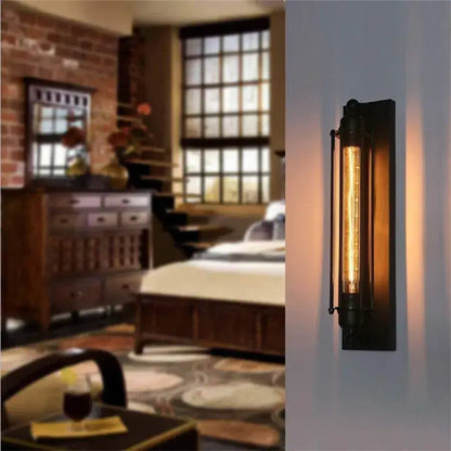 Black vintage industrial wall sconce with black metal frame and glowing edison bulb for bedroom decorbites wall sconce
