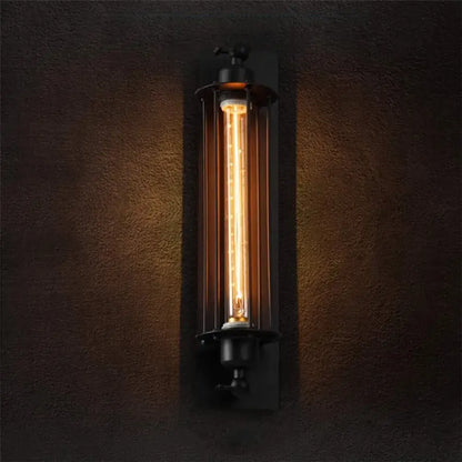 Black vintage industrial wall sconce by decorbites with black metal frame and illuminated edison bulb for bedroom decor