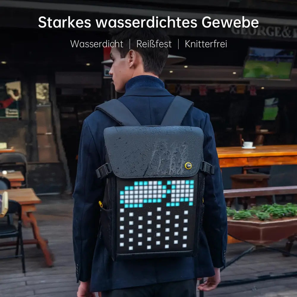 Black waterproof laptop backpack with rgb led screen displaying blue and white pixelated graphics on the front
