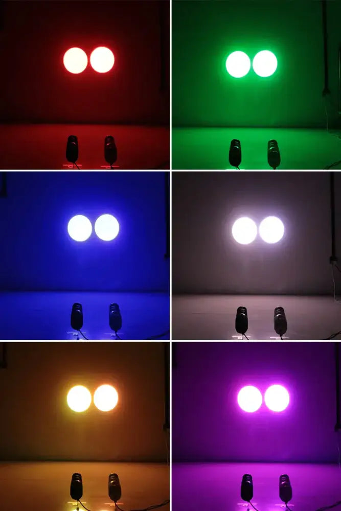 A pair of black 15w rgbw led pinspot beam lights with dual circular bulbs emitting vibrant multicolor light for events