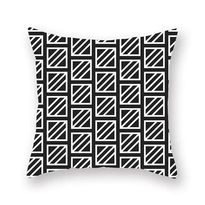 Black and white geometric star stripe throw pillow with diagonal stripes inside outlined squares for bedroom decor