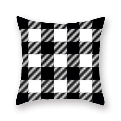 Black and white buffalo check throw pillow with bold geometric star stripe print for bedroom decor
