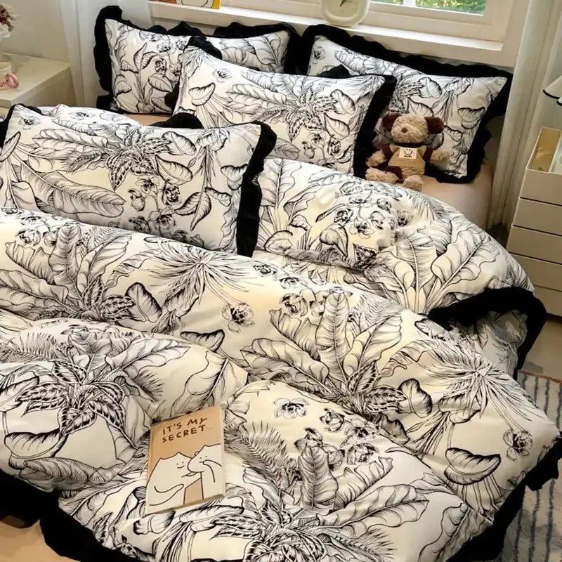 Black white printed floral ruffled bedding set featuring black white decorbites botanical print for stylish bedroom linens