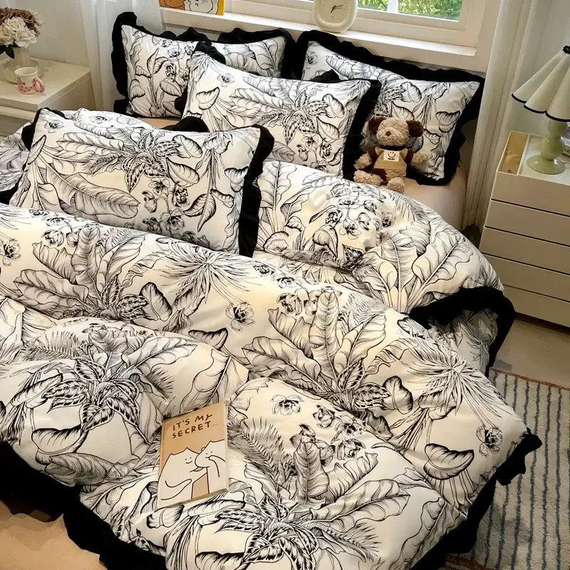 Black white printed floral ruffled bedding set with tropical leaf pattern from decorbites black white bedroom linens