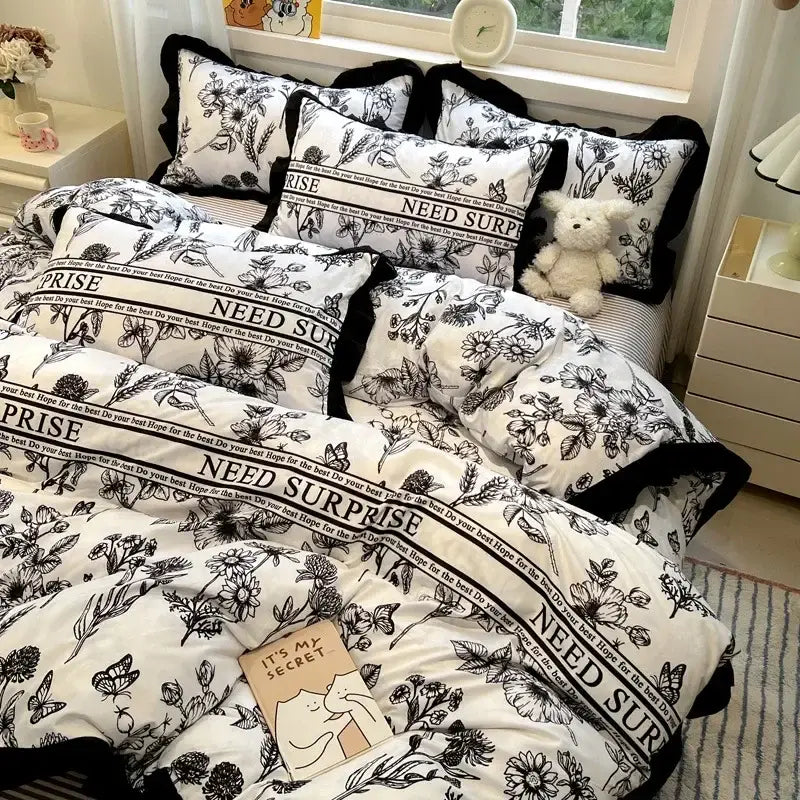Black white printed floral bedding set with bold black trim featuring ruffled decorbites black white bedroom linens