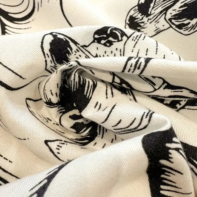 Off-white bedding set with black white printed cartoonish dog illustrations from decorbites black white collection