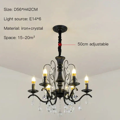Black wrought iron chandelier with crystal droplets and candle style lights for dining room use