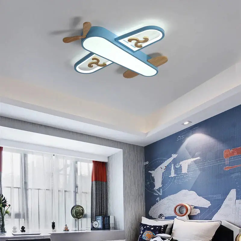 Blue airplane led wood ceiling light with illuminated wings for kids bedroom featuring decorbites led wood design