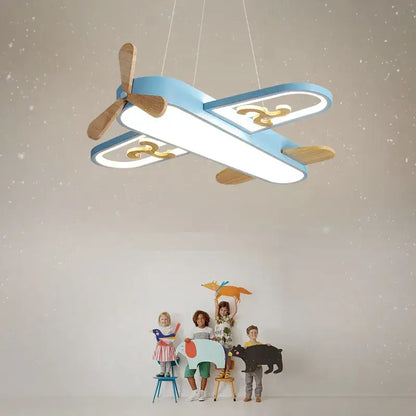 Blue airplane led wood ceiling light for kids bedroom with light blue airplane pendant, wooden propellers, and gold swirls decorbites led wood