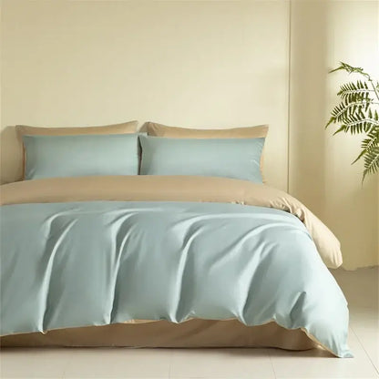Blue and beige egyptian cotton bedding set featuring light blue satin duvet cover, beige pillowcases, and matching bed skirt