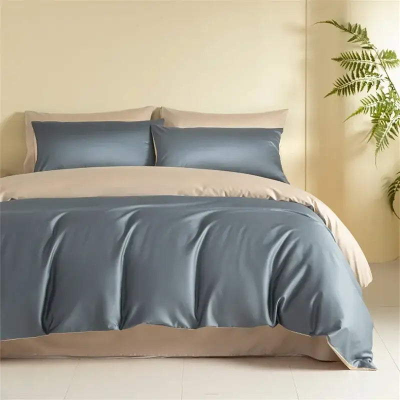 Blue and beige egyptian cotton bedding set featuring a blue satin duvet cover with matching pillowcases and beige bed skirt