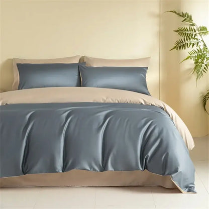 Blue and beige egyptian cotton bedding set featuring a blue satin duvet cover with matching pillowcases and beige bed skirt