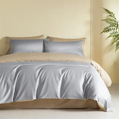 Silk-like gray duvet cover with matching beige pillowcases in a satin finish egyptian cotton bedding set for bedroom
