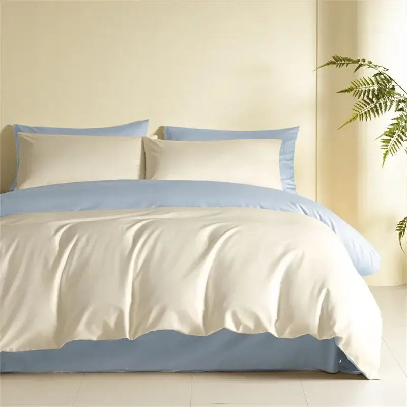 Blue and beige egyptian cotton bedding set featuring a soft cotton bedding set with creamy white and light blue piping