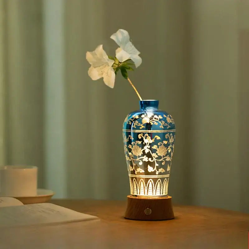 A blue and gold ceramic vase night light table lamp with warm internal illumination by decorbites liuguang qingying
