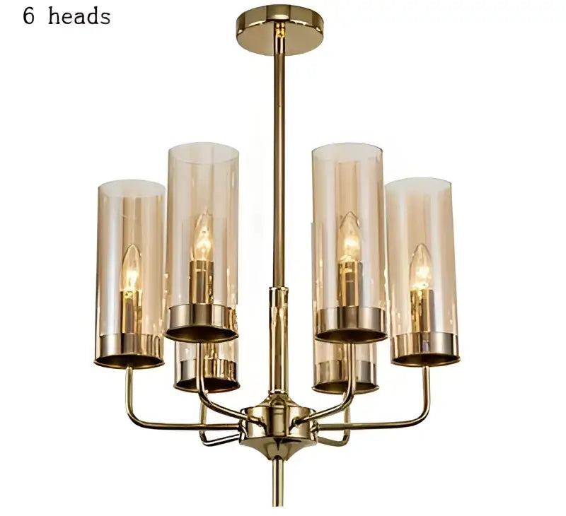 Blue and gold decorbites glass chandelier with six cylindrical glass shades and exposed filament bulbs for kitchen island lighting