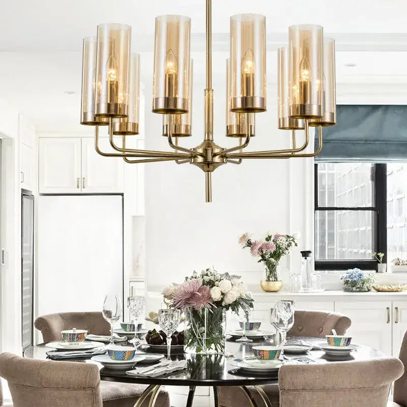 Brass-finished decorbites glass chandelier with eight amber glass shades for kitchen island lighting