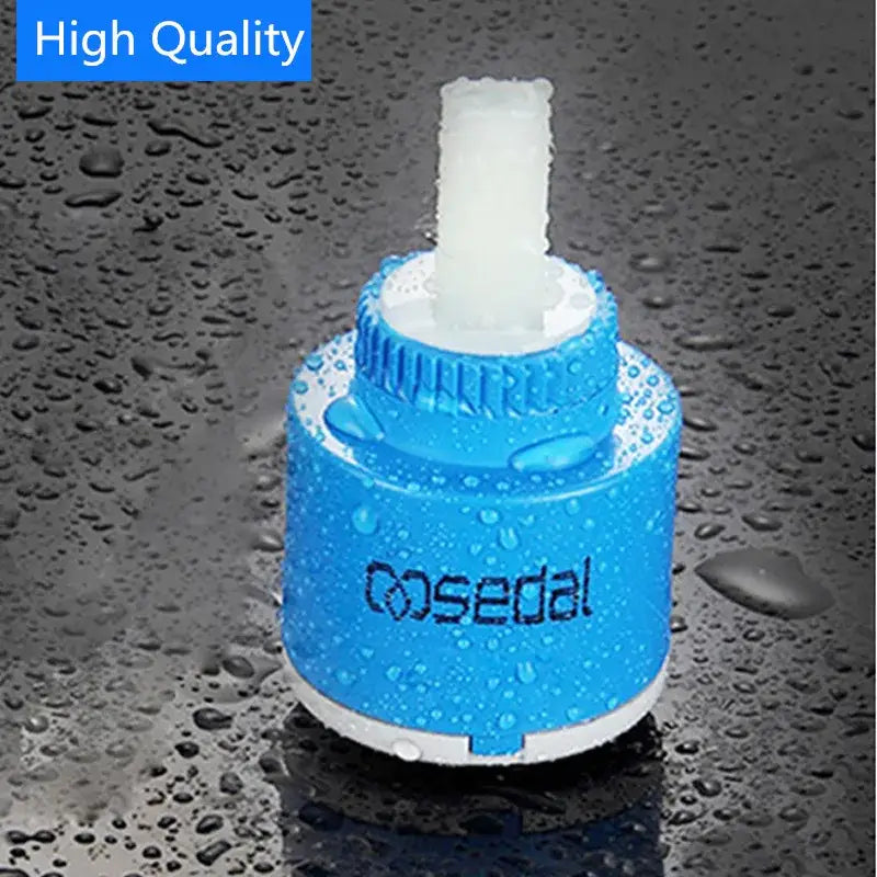 Blue and white 40mm ceramic faucet cartridge with textured grip branded osedal for kitchen water saving use