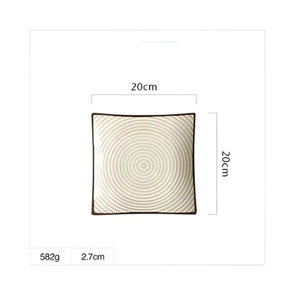 Beige woven cushion with concentric circles and dark brown border shown with blue and white crackle glaze porcelain square dinner plate