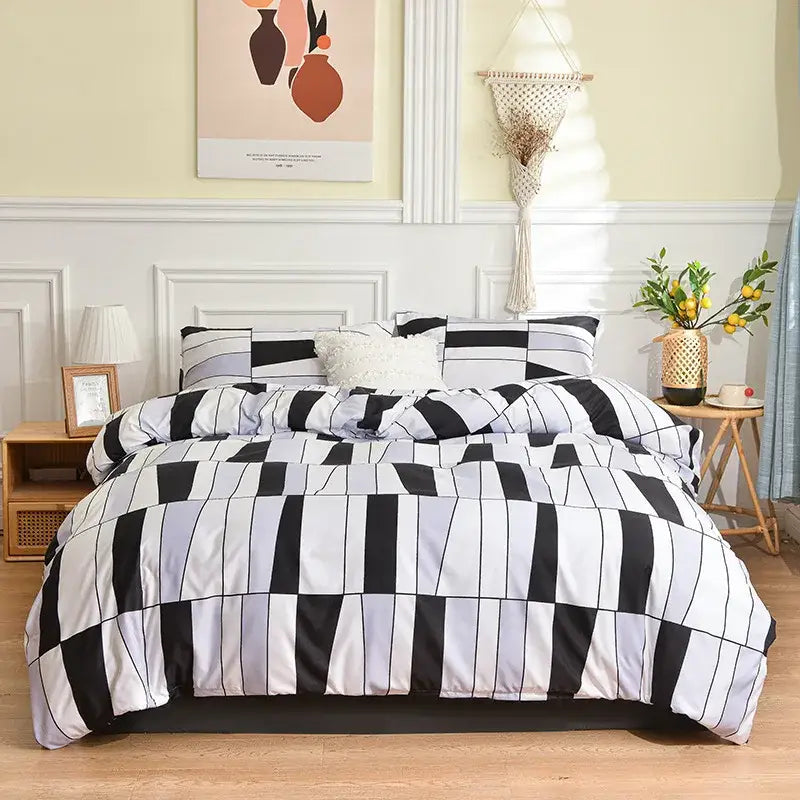 Black and white piano key patterned duvet cover set paired with decorbites geometric stripes bedding for stylish bedroom decor