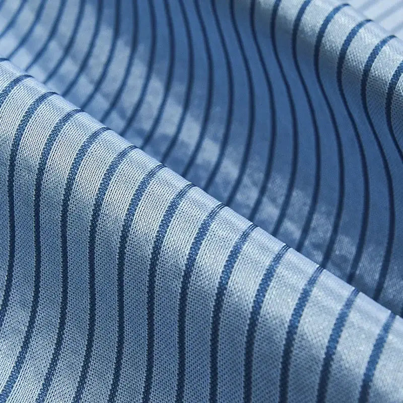 Light blue fabric cooling mat with thin dark navy vertical stripes decorbites ice silky cooling bedroom pad