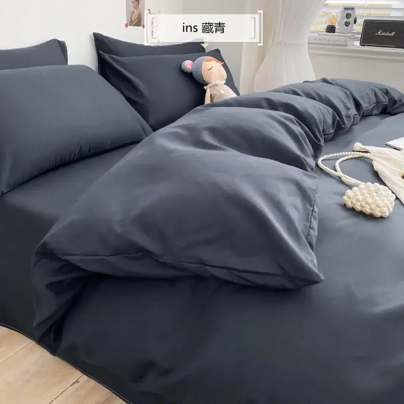 Dark gray soft-textured bedding set with matching duvet cover and pillows for decorbites comfort king size bedroom